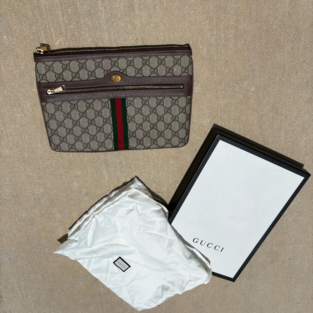 GG Supreme Monogram Large Ophidia Pouch Clutch Brown
In excellent condition